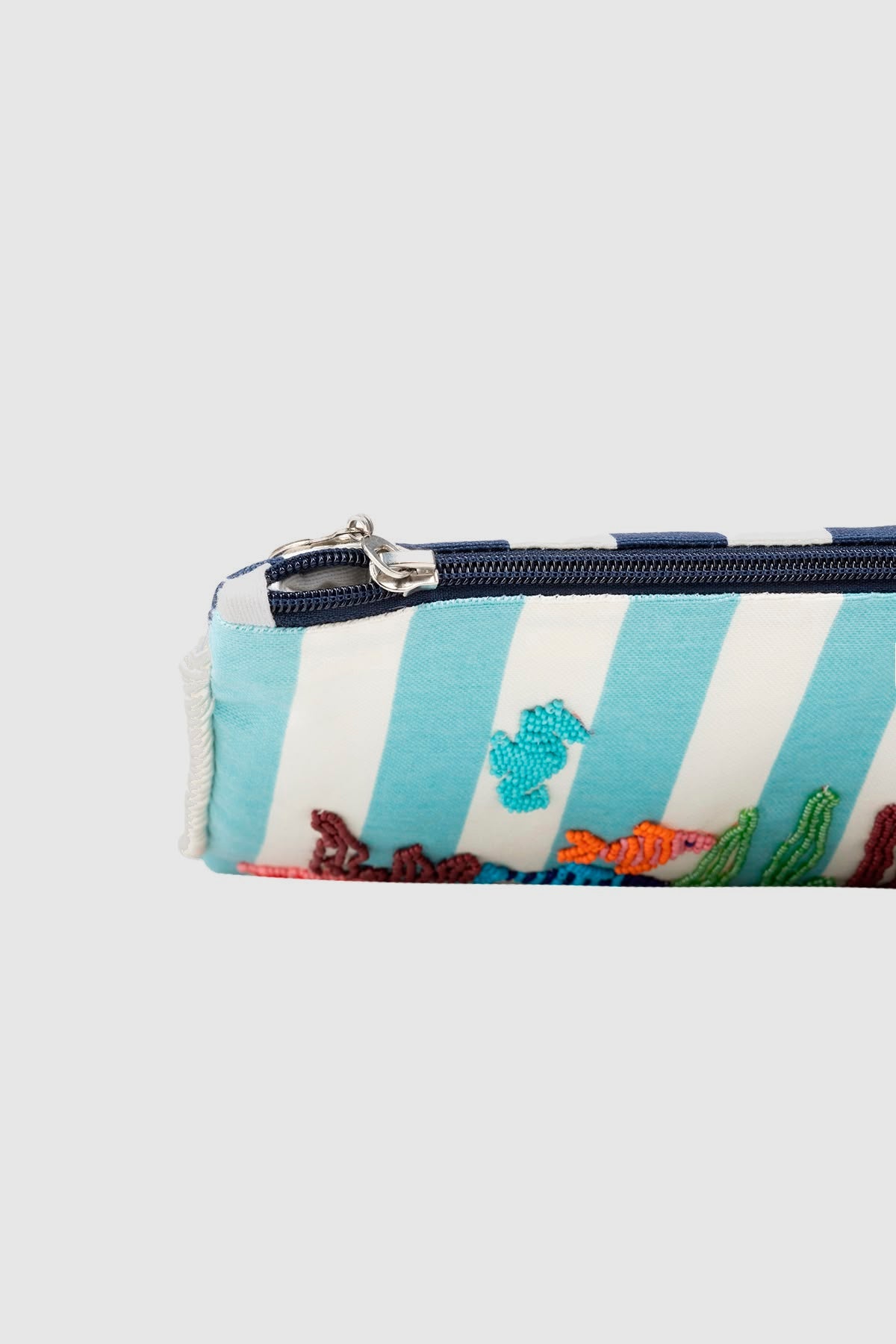 Natural Art Pieces turquoise striped clutch with punched tropical fish, view 4