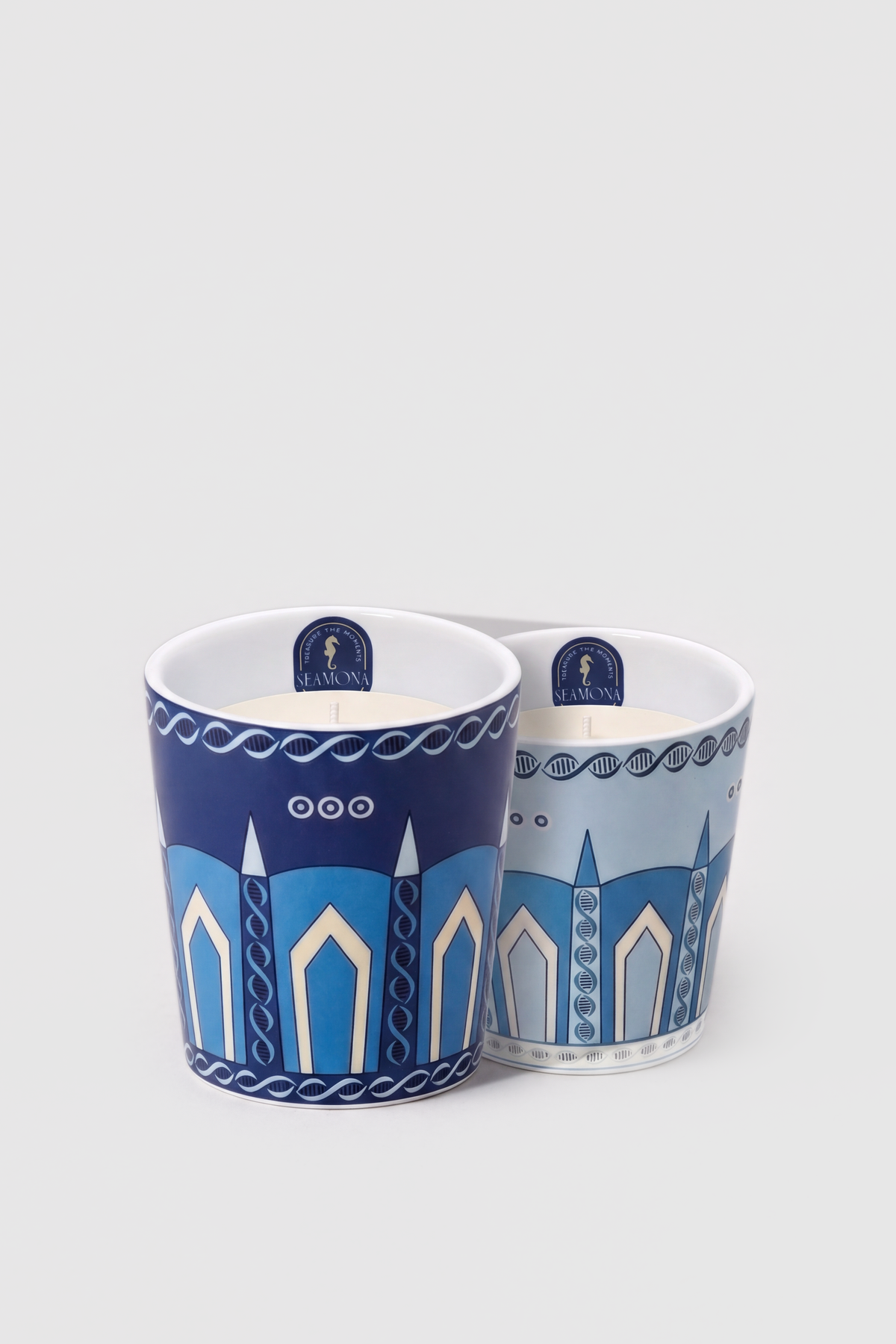 Space Sparkle navy and ice blue porcelain candle vases, front view