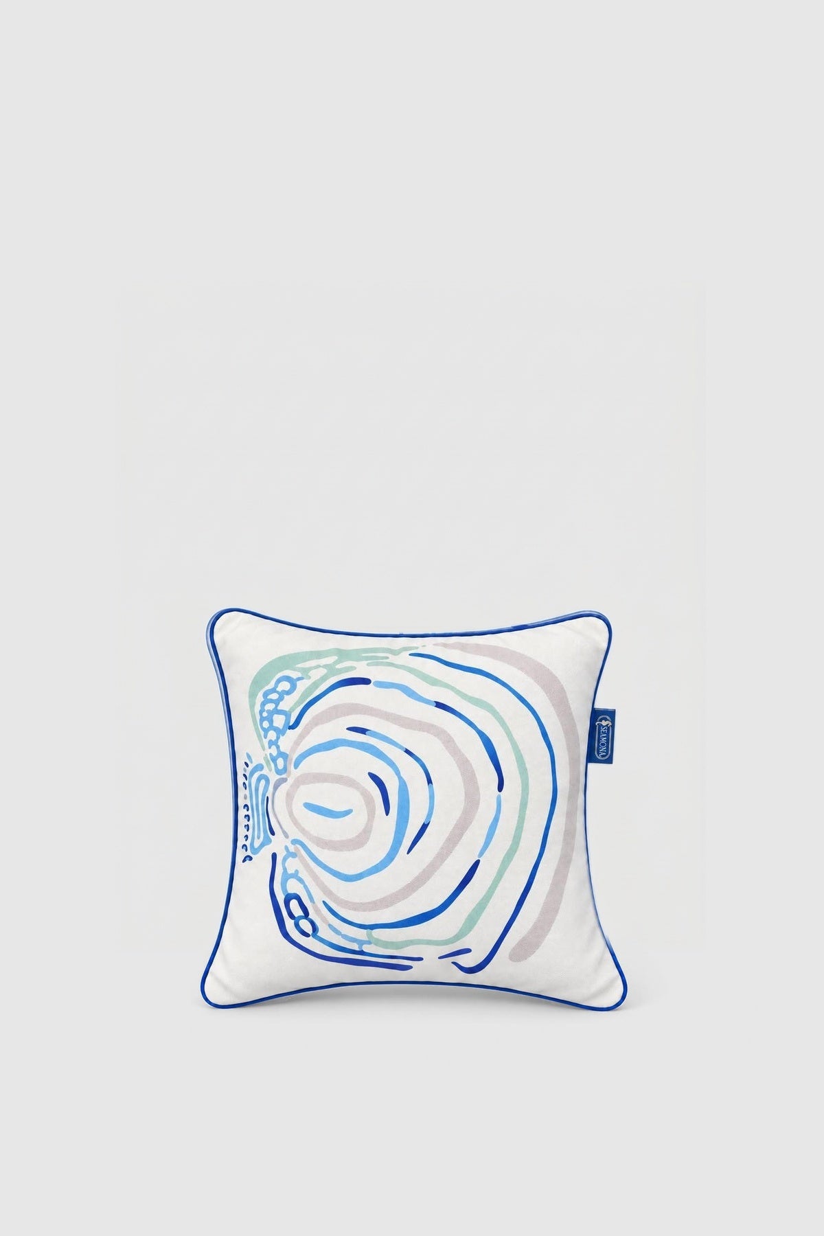 Angel white fish pillow 40x40 with blue and teal rings, front view