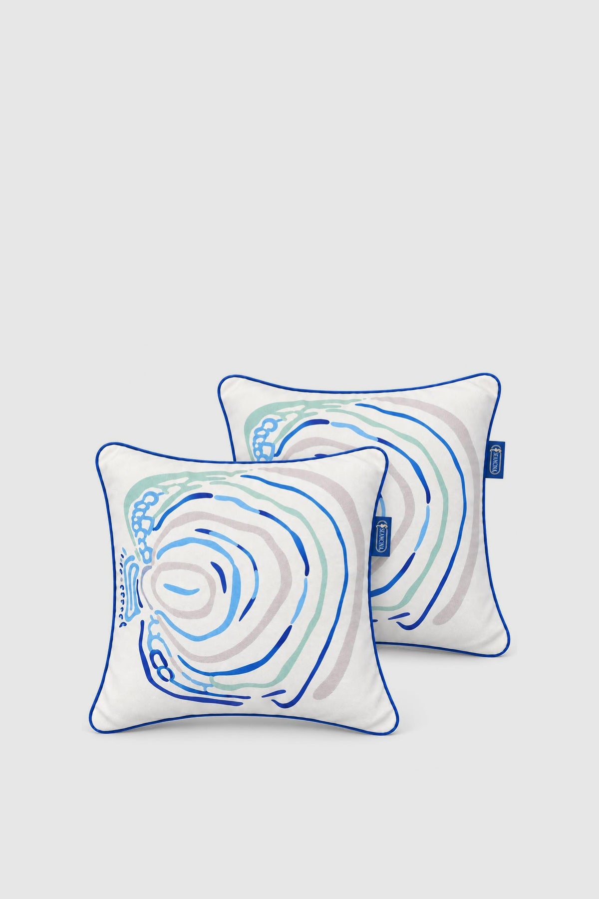 Angel white fish pillow 40x40 with blue and teal rings, view 3